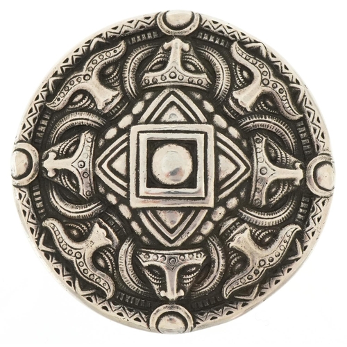 3502 - Henrik Møller, Norwegian Celtic style brooch embossed with masks, 7cm in diameter, 51.0g