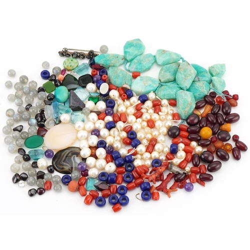 3530 - Large collection of semi precious stones and simulated pearls including amber coloured beads, garnet... 