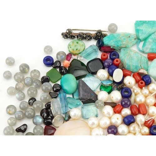 3530 - Large collection of semi precious stones and simulated pearls including amber coloured beads, garnet... 