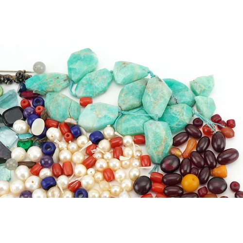 3530 - Large collection of semi precious stones and simulated pearls including amber coloured beads, garnet... 