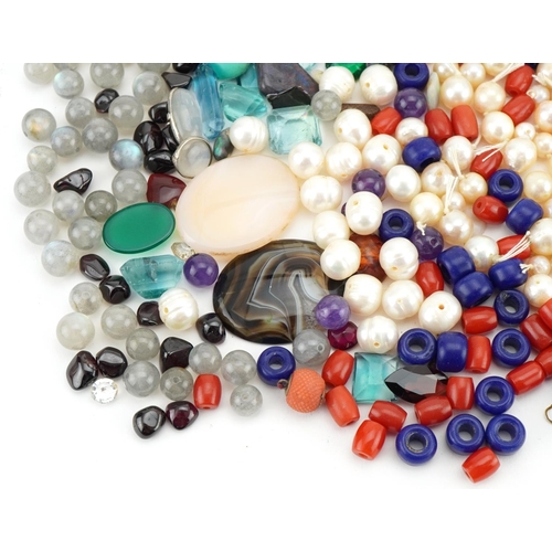 3530 - Large collection of semi precious stones and simulated pearls including amber coloured beads, garnet... 