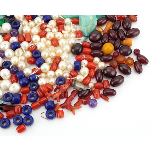 3530 - Large collection of semi precious stones and simulated pearls including amber coloured beads, garnet... 