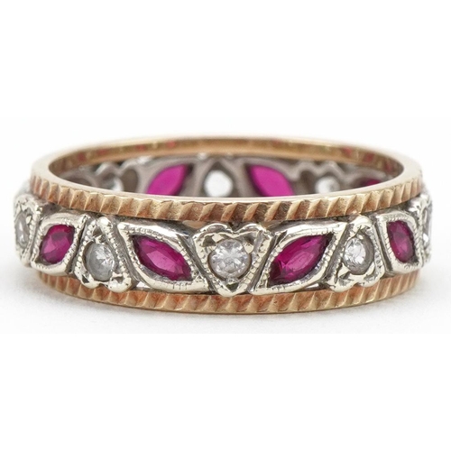 3155 - 9ct gold ruby and white spinel eternity ring, size Q/R, 4.2g