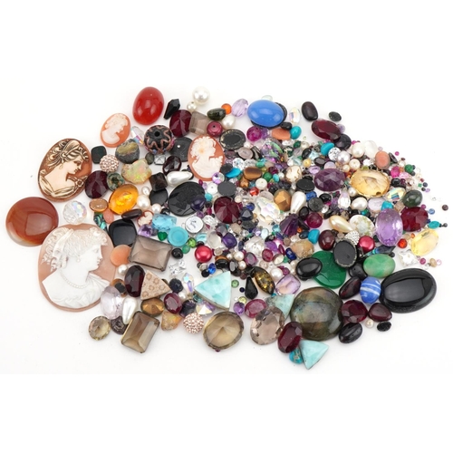 3561 - Large collection of semi precious stones and cameo panels including amethyst, garnet, tiger's eye, s... 