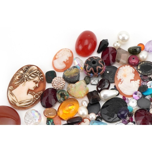 3561 - Large collection of semi precious stones and cameo panels including amethyst, garnet, tiger's eye, s... 