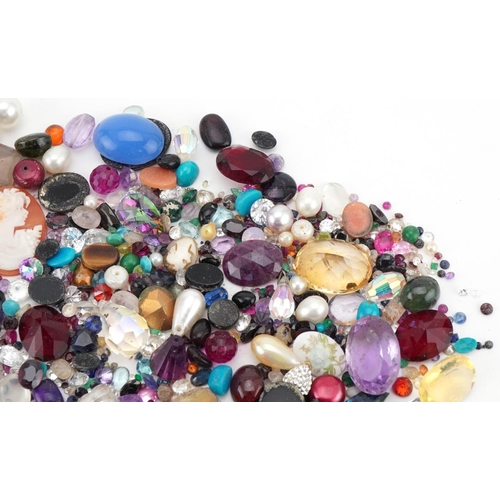 3561 - Large collection of semi precious stones and cameo panels including amethyst, garnet, tiger's eye, s... 