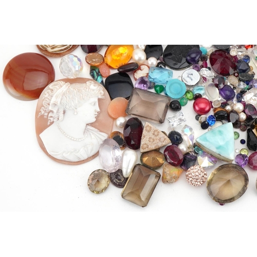 3561 - Large collection of semi precious stones and cameo panels including amethyst, garnet, tiger's eye, s... 