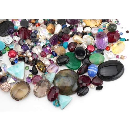 3561 - Large collection of semi precious stones and cameo panels including amethyst, garnet, tiger's eye, s... 