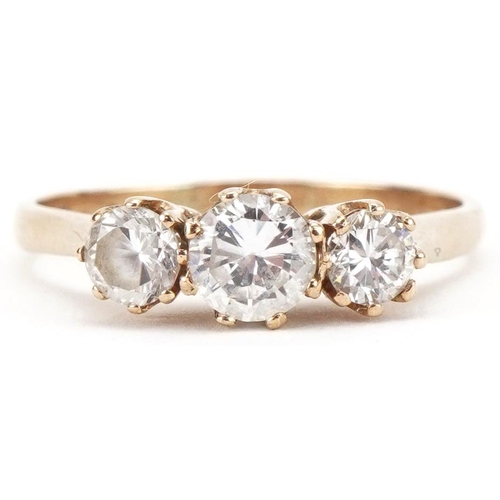 3097 - 9ct gold ring set with three clear stones, possibly cubic zirconia, size Q/R, 2.4g