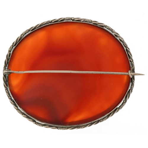 3423 - Large unmarked silver mounted agate brooch, 6.5cm wide, 39.2g