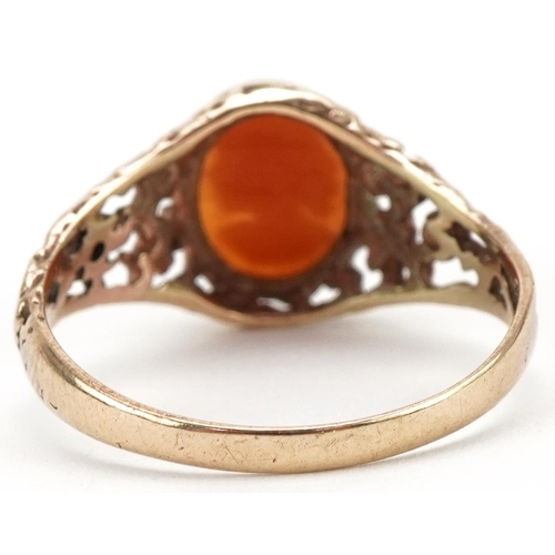 3256 - 9ct gold cameo shell ring carved with a maiden head having pierced shoulders, size T, 2.7g