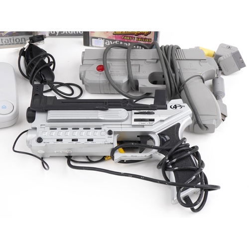 2378 - PlayStation 1 games console with controllers and accessories and a collection of games including Ray... 