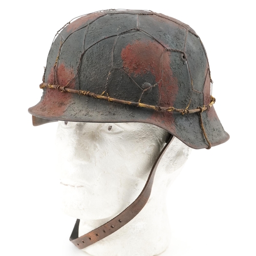 2594 - German military interest tin helmet with SS decal