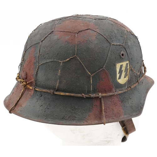 2594 - German military interest tin helmet with SS decal