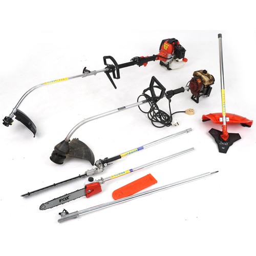 773 - Two petrol garden strimmers with various attachments