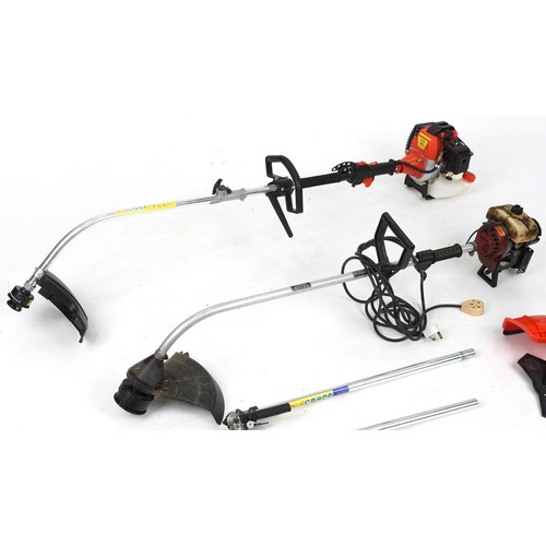 773 - Two petrol garden strimmers with various attachments