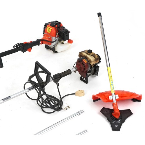 773 - Two petrol garden strimmers with various attachments