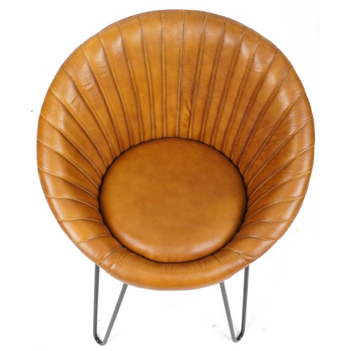 704 - Modern tan brown leather shell back chair on pin legs, 74cm H x 60cm W x 50cm