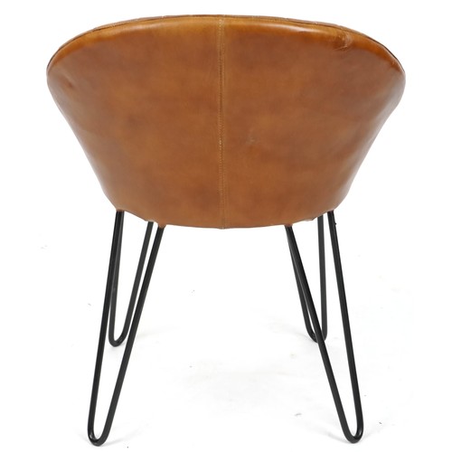 704 - Modern tan brown leather shell back chair on pin legs, 74cm H x 60cm W x 50cm