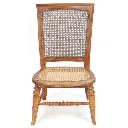 694 - Early 20th century beech framed nursing chair with cane seat and back, 73cm H x 44cm W x 49cm D