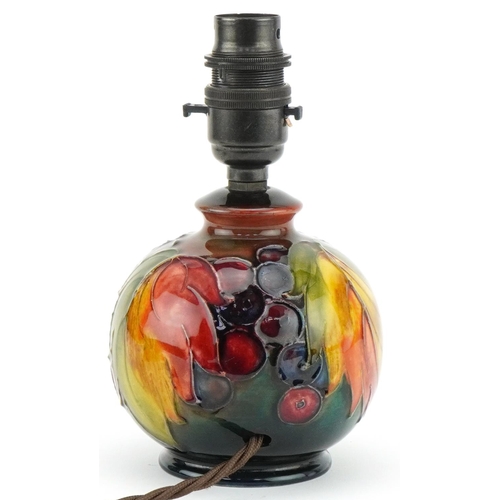 363 - Moorcroft flambé lamp decorated with leaf and berries, 16cm high