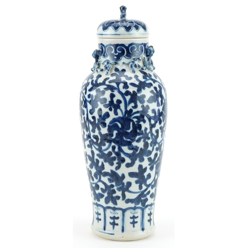 1201 - Chinese porcelain vase and cover hand painted in a floral pattern, 35cm high