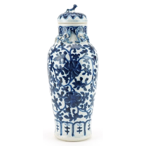 1201 - Chinese porcelain vase and cover hand painted in a floral pattern, 35cm high