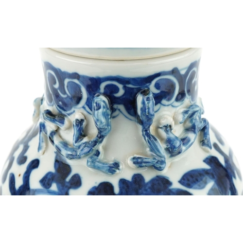 1201 - Chinese porcelain vase and cover hand painted in a floral pattern, 35cm high