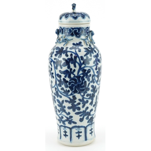 1201 - Chinese porcelain vase and cover hand painted in a floral pattern, 35cm high