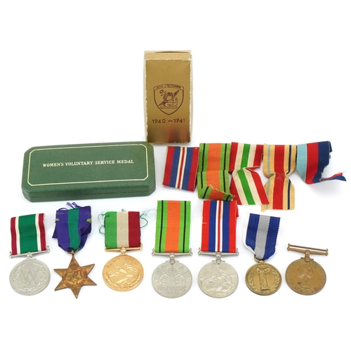 2531 - Military interest medals WWII medals including a boxed Women's Voluntary Service medal and an Oman m... 