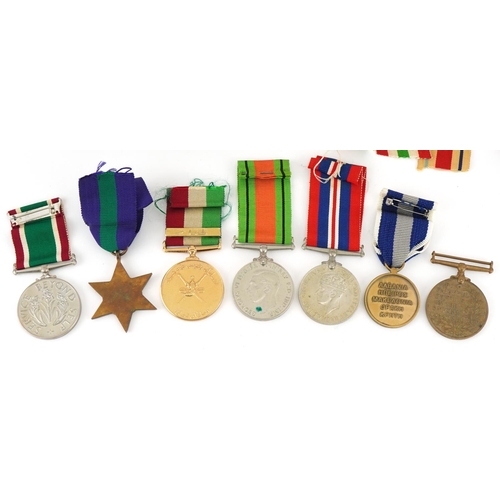 2531 - Military interest medals WWII medals including a boxed Women's Voluntary Service medal and an Oman m... 