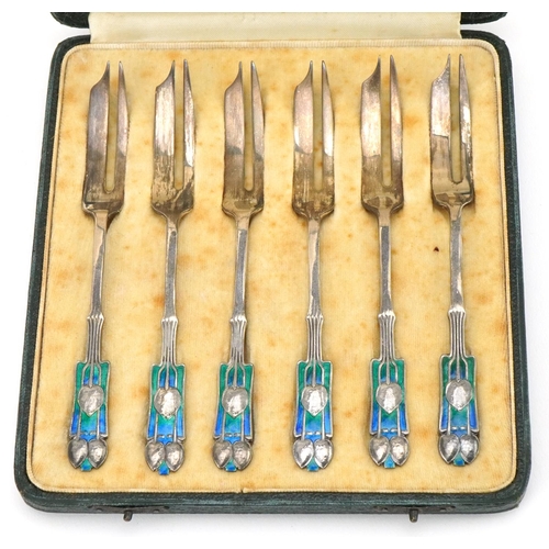 12 - Cased set of six Liberty Art Nouveau silver and enamel cake forks, Birmingham 1934, housed in origin... 