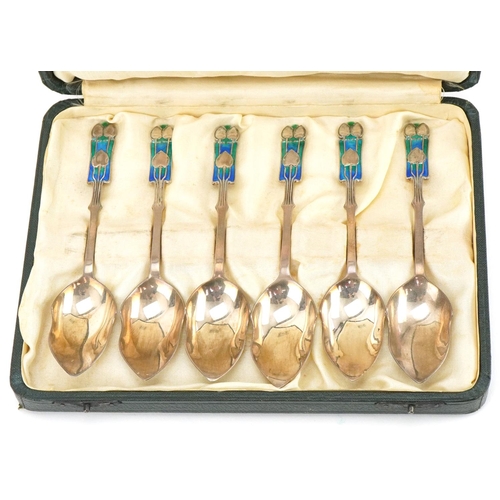 11 - Cased set of six Liberty Art Nouveau silver and enamel spoons, Birmingham 1934, housed in original L... 