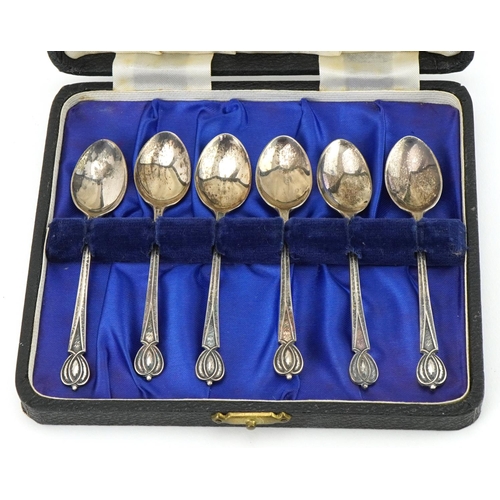 13 - Set of six Liberty silver tea spoons, Birmingham 1899, 9.5cm long, 43.6g, within a fitted Liberty ca... 