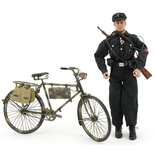 2573 - German military interest; figure on a bicycle with working headlight and holding a rifle, overall 30... 