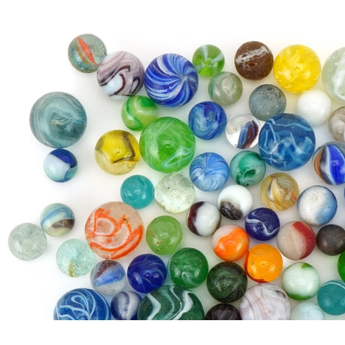 2314 - Collection of 19th century and later glass marbles, the largest 25mm in diameter