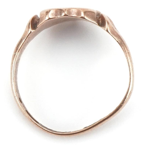 3320 - 9ct rose gold signet ring in the form of a shield, size M, 2.9g