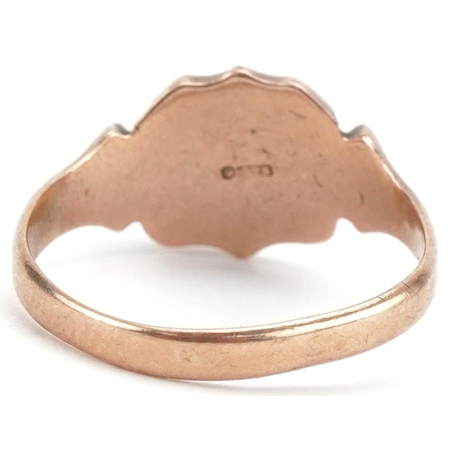 3320 - 9ct rose gold signet ring in the form of a shield, size M, 2.9g