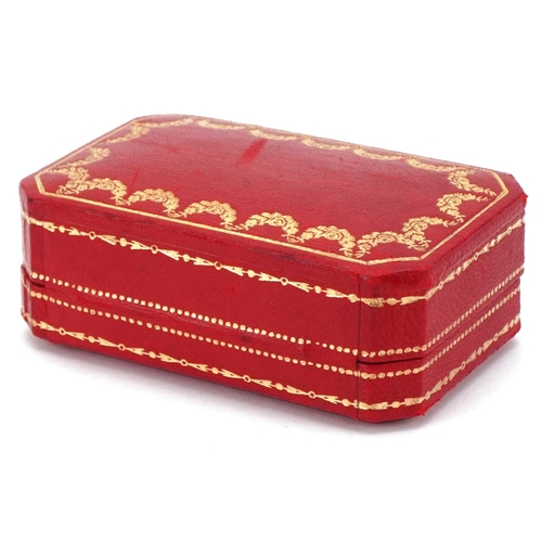 3576 - Cartier, tooled red leather cufflink box, 8cm wide