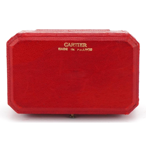 3576 - Cartier, tooled red leather cufflink box, 8cm wide