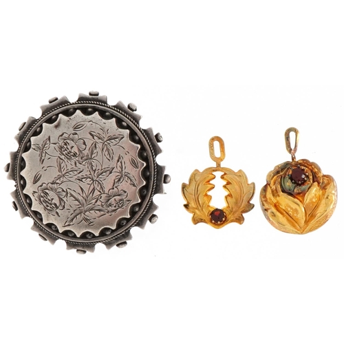 3539 - Victorian aesthetic unmarked silver mourning brooch and two silver gilt garnet pendants with certifi... 