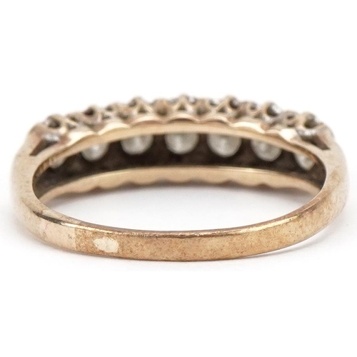 3010 - 9ct gold diamond half eternity ring set with seven diamonds, total diamond weight approximately 0.50... 