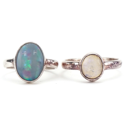 3367 - Two silver Australian opal rings, sizes G and O, total 4.9g