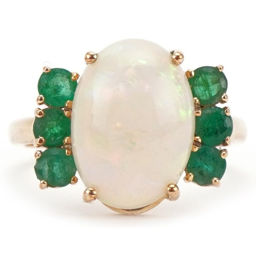 3284 - 9ct gold cabochon opal and emerald ring, size O, 3.8g