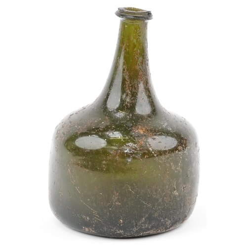 1162 - Antique mallet shaped green glass wine bottle found in a skip in Westgate Street Lewes, 19cm high