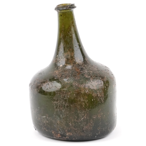 1162 - Antique mallet shaped green glass wine bottle found in a skip in Westgate Street Lewes, 19cm high