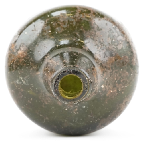 1162 - Antique mallet shaped green glass wine bottle found in a skip in Westgate Street Lewes, 19cm high