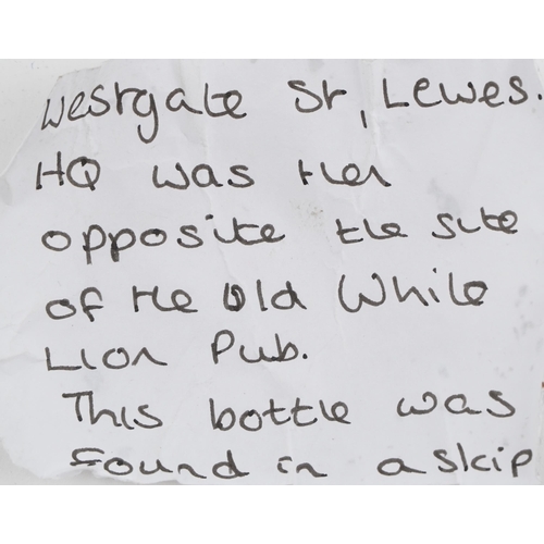 1162 - Antique mallet shaped green glass wine bottle found in a skip in Westgate Street Lewes, 19cm high