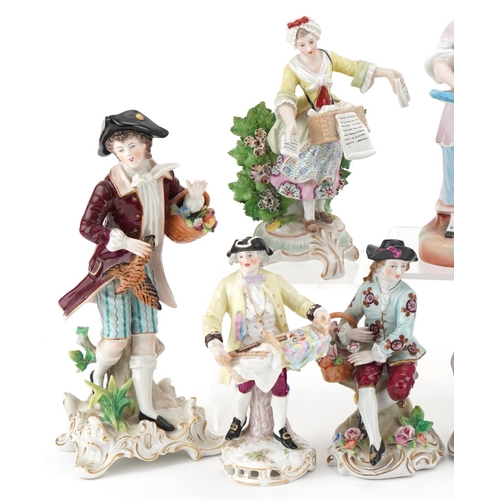 1103 - Ten continental porcelain floral encrusted models including a figure group of The Lovers, the larges... 