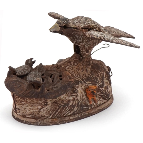 2323 - Cast iron trick bird moneybox, 18cm in length